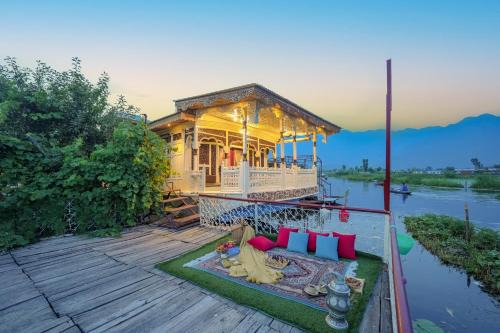 Dal Lake Boat Rental | SaffronStays Kingori Houseboat - luxury houseboat with private deck, shikara high tea & lake views