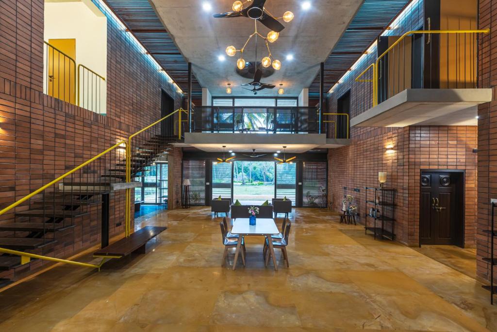 Palahalli House | SaffronStays Riverstone 3-BR Riverside Villa with Farm Views
