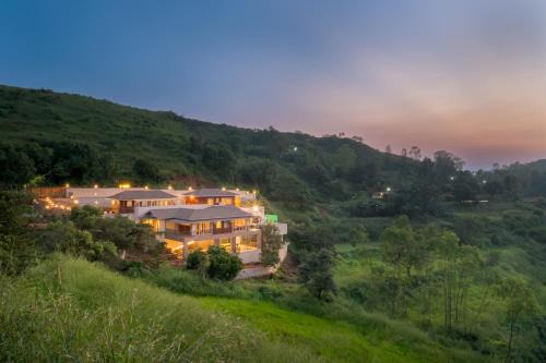 Mahabaleshwar Villa | SaffronStays Skyfall - 4BR boho-chic villa with pool, jacuzzi, game room & stunning hill views near Table Land, Panchgani
