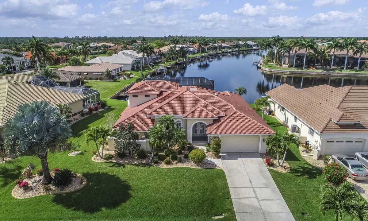 Burnt Store Isles House | Sailboat-Access Waterfront Retreat with Sunset Pool Living