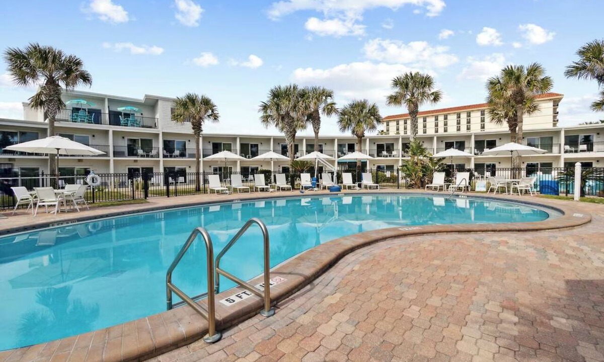 Neptune Beach Hotel | Salty Beachside Haven with Outdoor Swimming Pool and Stunning Ocean Views