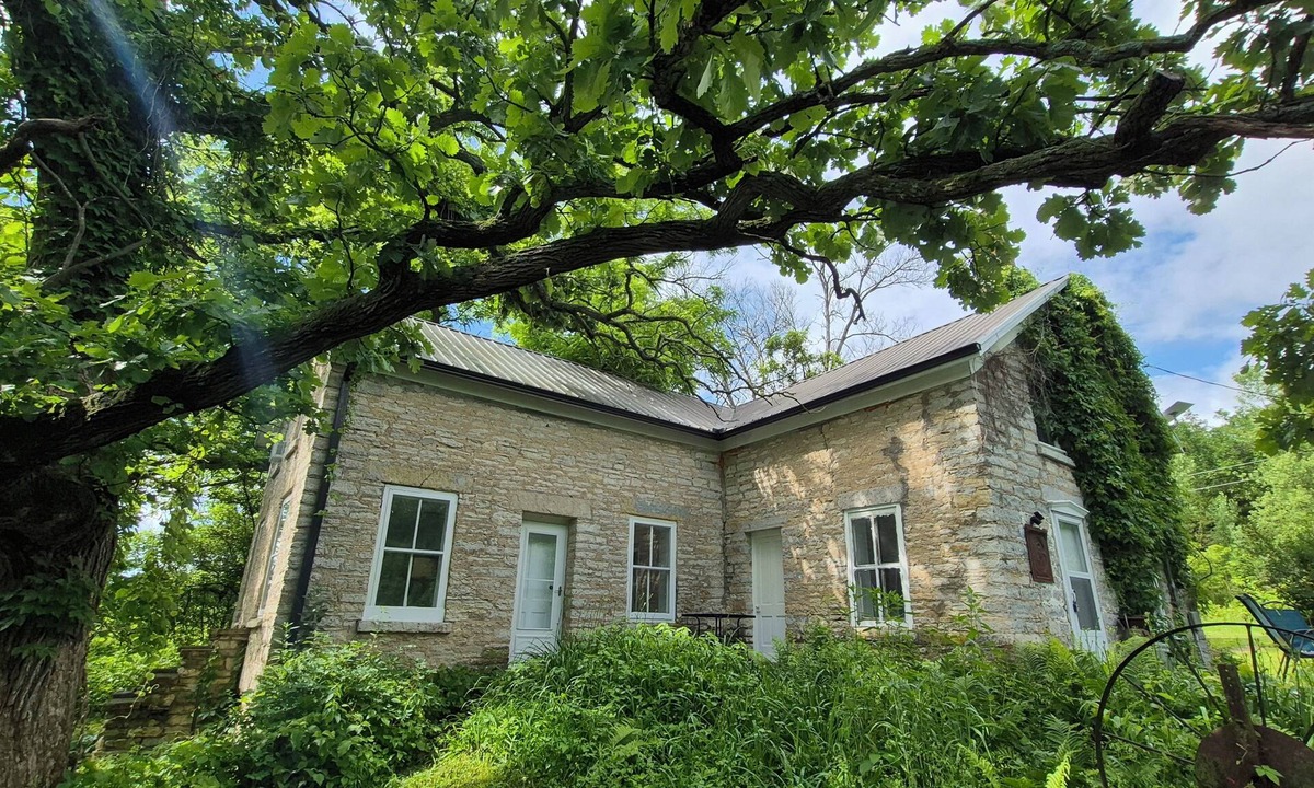 Decorah House | Secluded 1860 Stone House recently remodeled on the Upper Iowa River by Bluffton