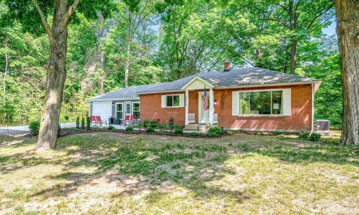 Fennville Cottage | Secluded & cute cottage near Pier Cove Beach with deck, firepit, grill, lawn, AC