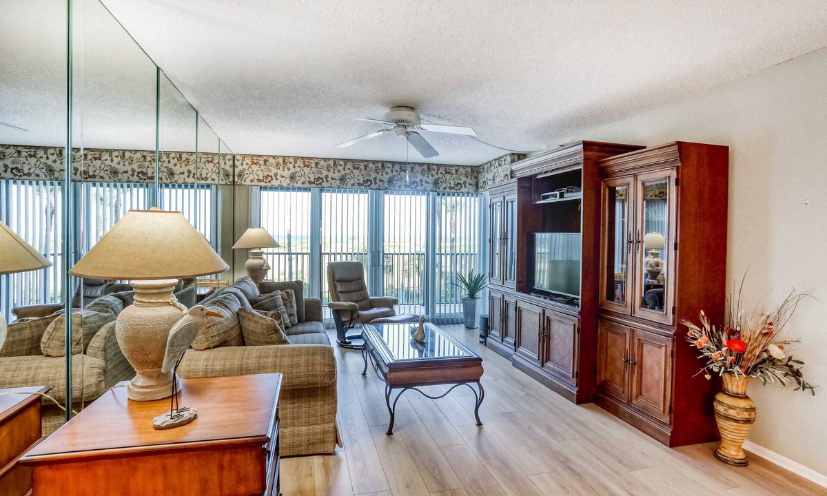 Sand Key House | Second floor condo with pool and tennis court private WD and central AC