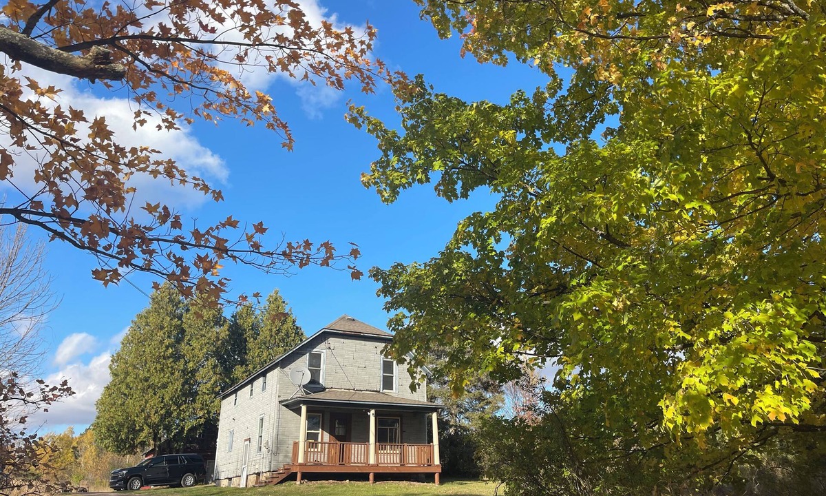 Crystal Falls House | Serene 40-Acre Farmhouse Retreat in Crystal Falls, MI
