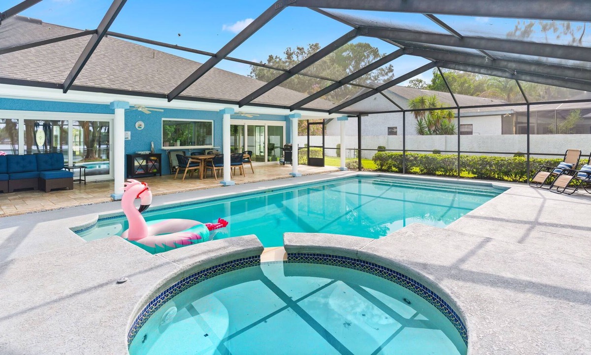 Lutz House | Serene Lakefront, Pool & Beach Oasis