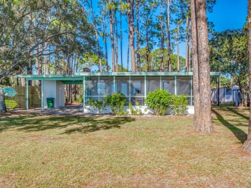 Panacea House | Shoreline Serenity- The Golden Goat on the Bay