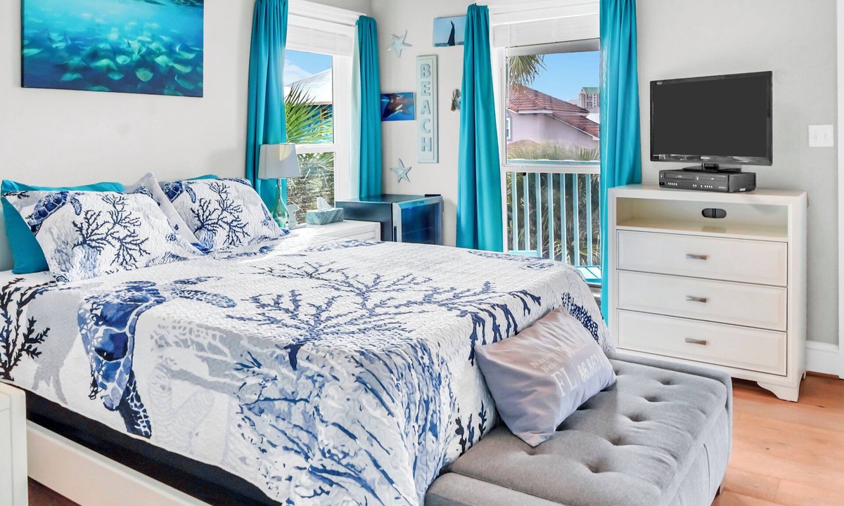 Navarre Beach House | Sleeps 10 with 8 beds! Decks, decks and more decks!