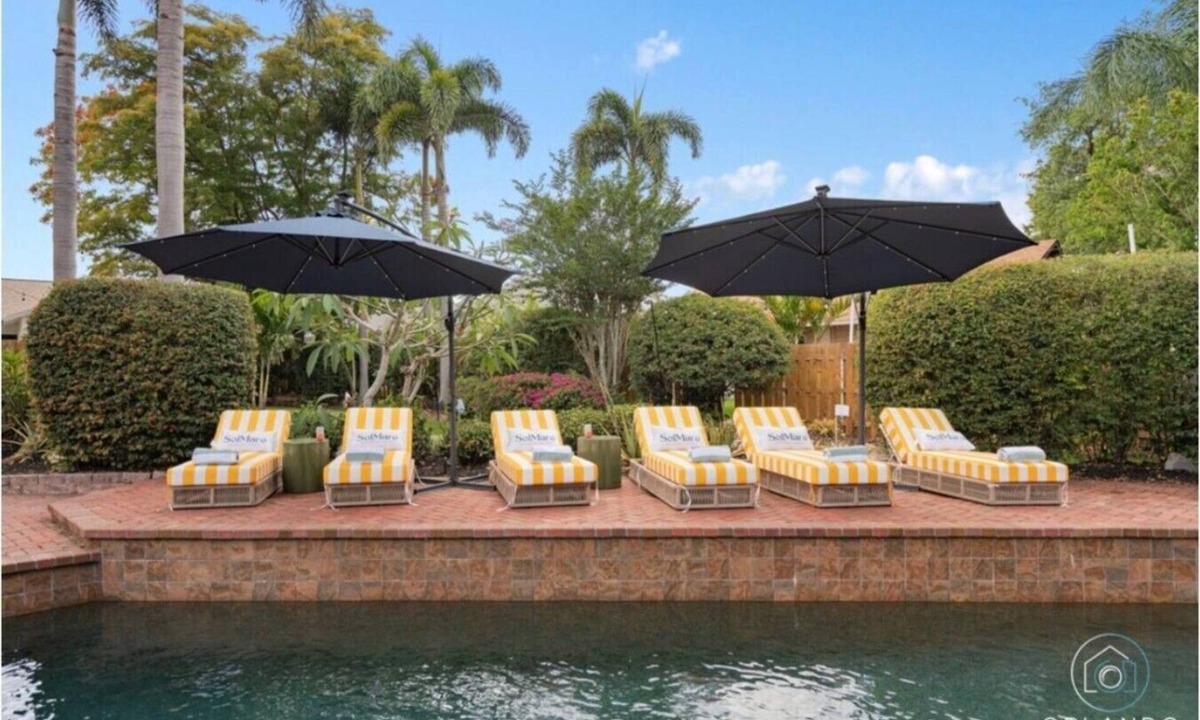 Palma Sola House | SolMaré - 5Br, pool, spa, game room, mini golf!