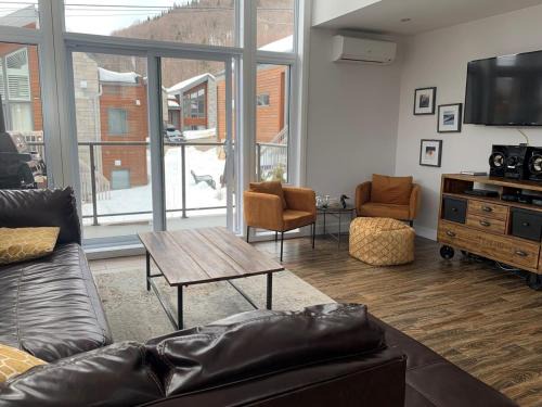 Stoneham Ski Chalet | Spa privé et billard pret de la montagne de ski Stoneham 12 personnes