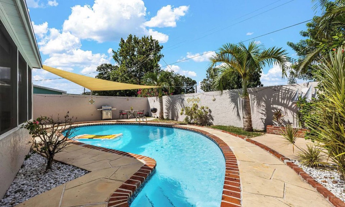 Melbourne House | SpaceCoast Charm — 3BR Home. Heated Pool & Terrace