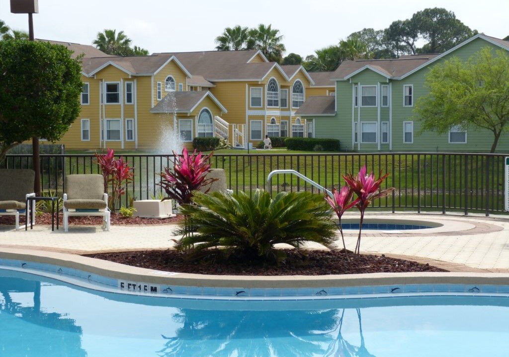 Grand Palms House | Spacious 2 bed 2 bath townhome with heated community pool & spa at gated community Mango Key near Disney, Orlando, Florida