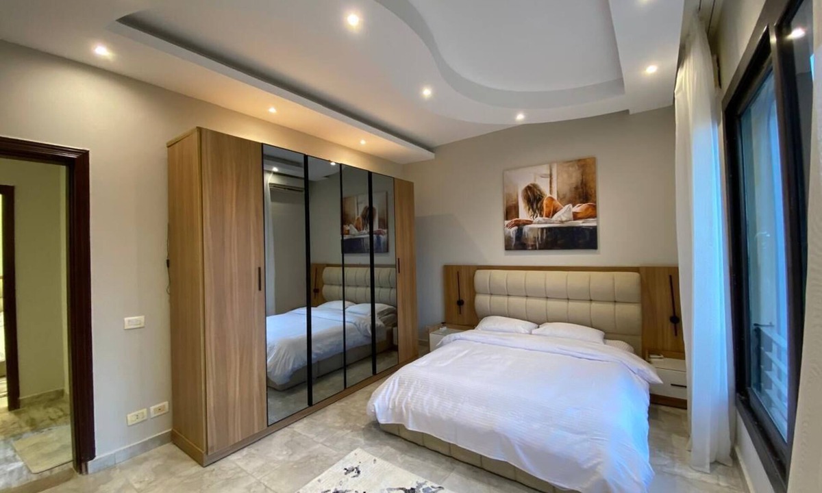 6th of October City Apartment | Spacious -2 bedroom apartment in adorable El Shikh Zaid with AC
