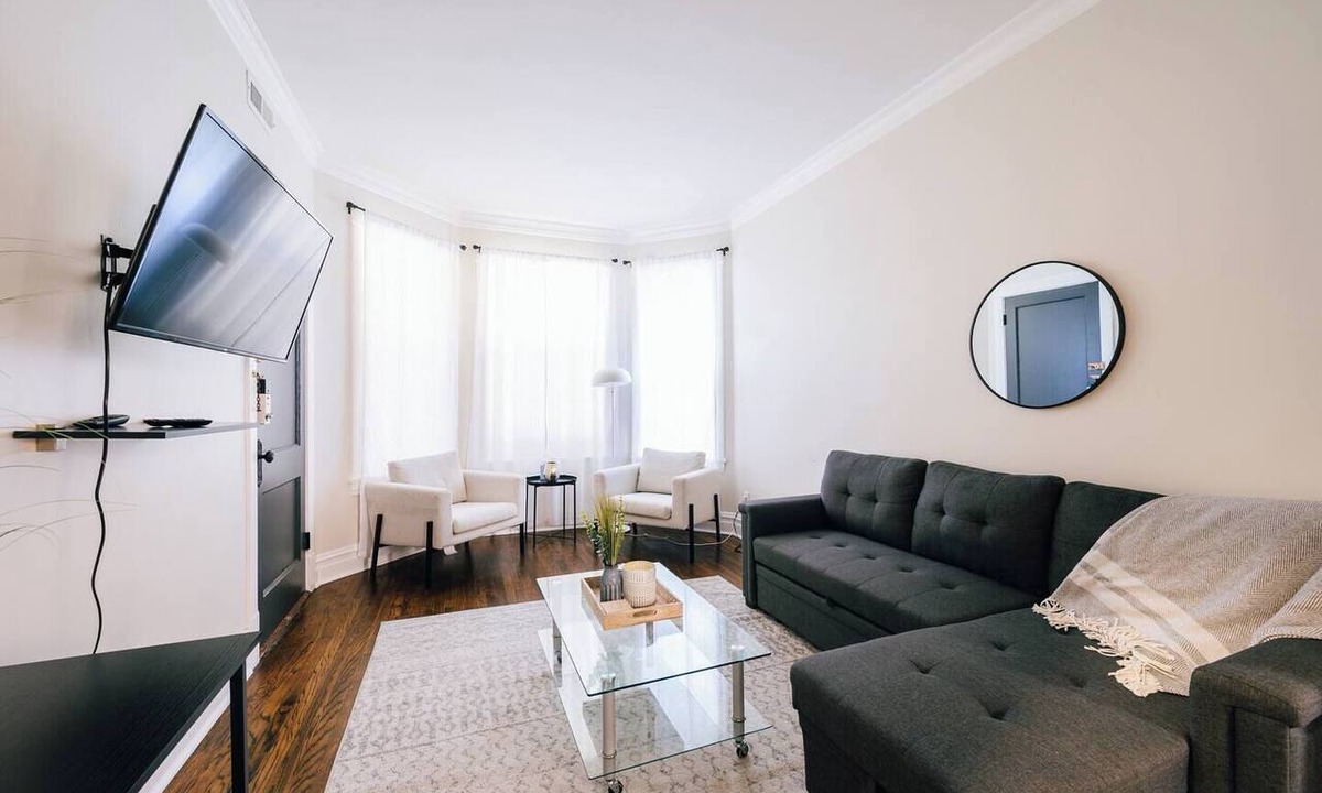 Logan Square Apartment | Spacious 3-bedroom retreat in West Logan with modern amenities, perfect for families looking to relax and explore vibrant Logan Square.