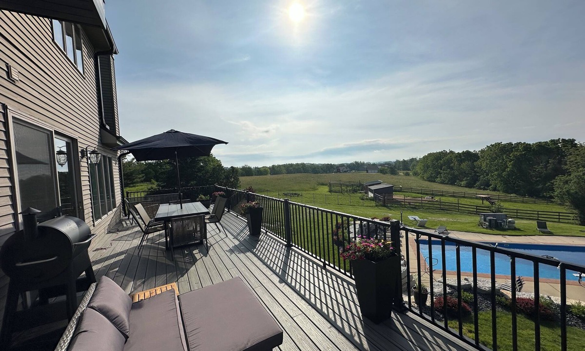 Dane County House | Spacious 5-bedroom house sleeps 14 with pool, hot tub, sauna and more!