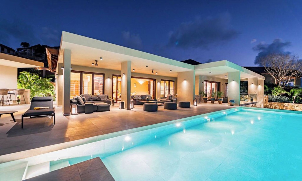 Jolly Harbour House | Spacious 6 bedroom hillside villa w/infinity pool, gym, and stunning views.
