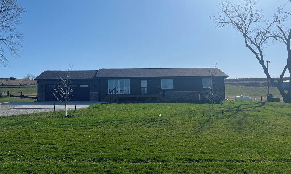 Harrison County House | Spacious and cozy 4-bedroom house in rural Iowa with inground backyard pool.
