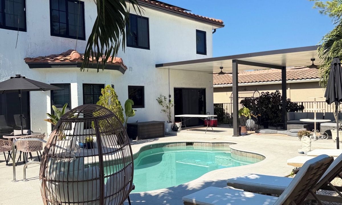 Royal Palm Beach House | Spacious Boutique style Water Front pool home - Near Wellington Polo/Equestrian