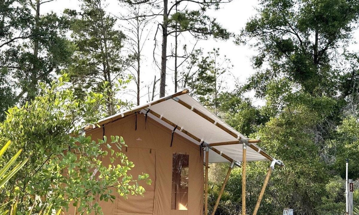 Braden River RV Rental | Spacious Double Safari Tent with Private Fire Pit Near Anna Maria Island in Bradenton, Florida
