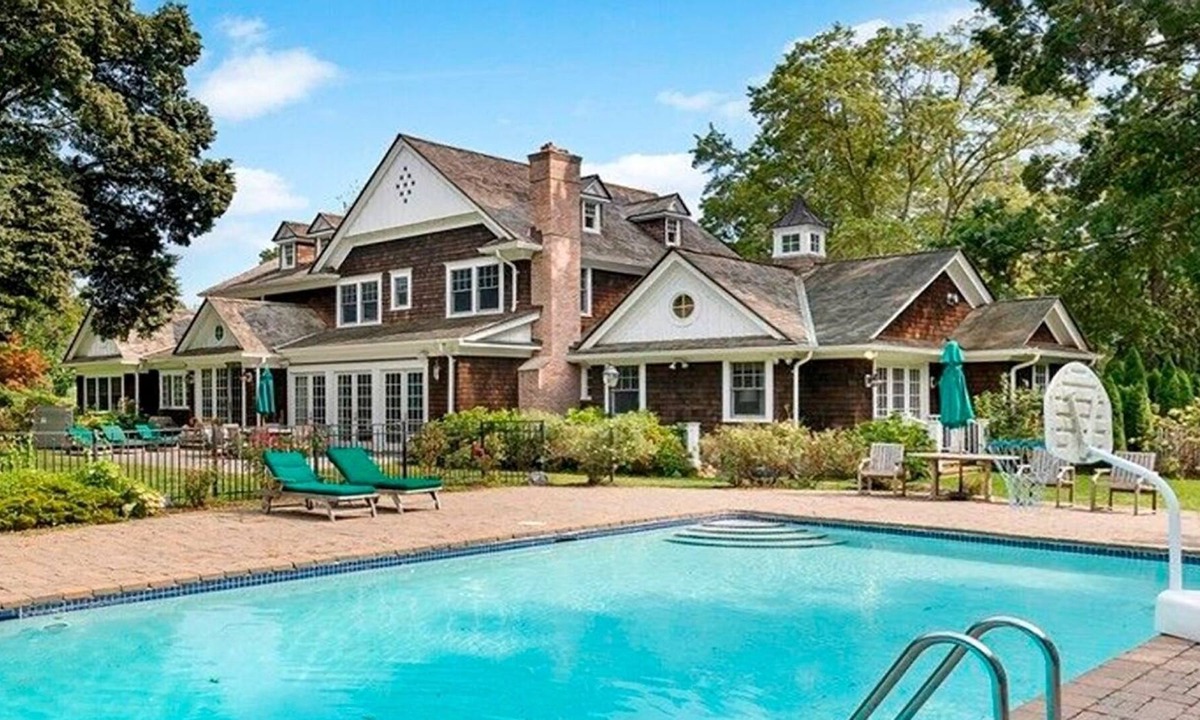 Old Brookville House | Spacious Hampton style house with giant indoor basketball court.