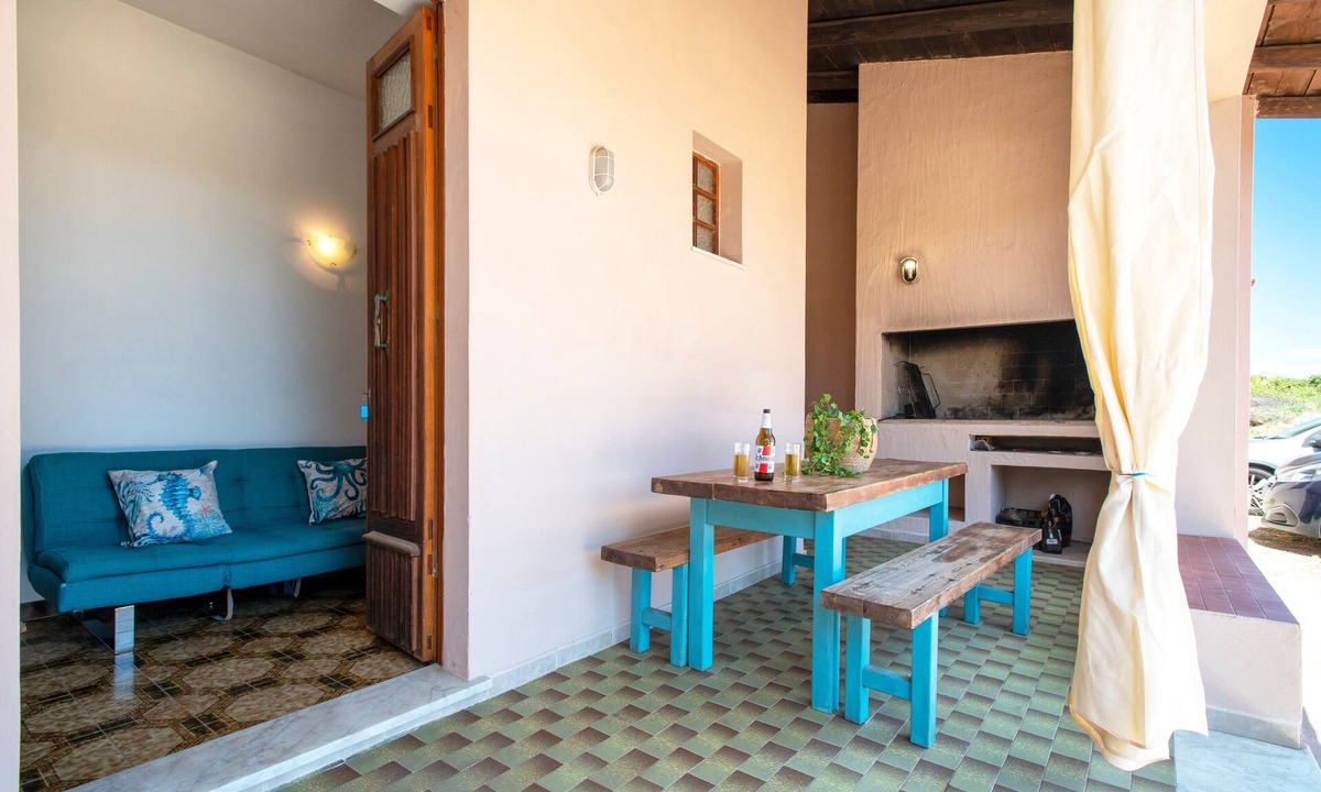 Paduledda House | Spacious House in Costa Rossa with Partial Sea View and Terrace