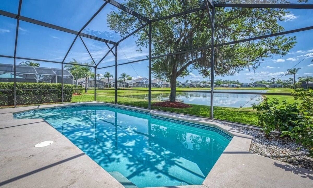 Lake Berkley Villa | Spacious Lakefront Home with Pool & Resort Perks