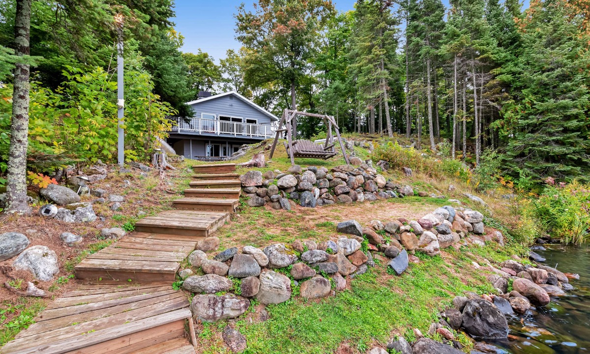 Land O Lakes House | Spacious lakefront home with pier views, canoe, and fire pit - family-friendly