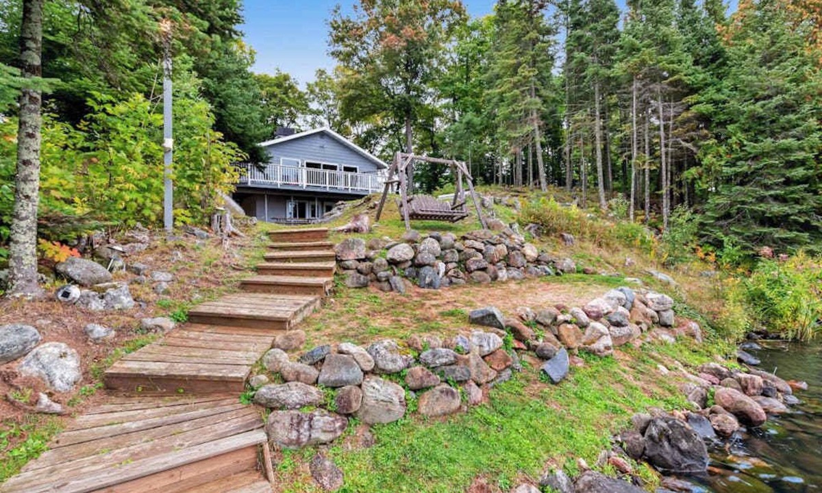 Land O Lakes House | Spacious lakefront home with pier views, canoe, and fire pit - family-friendly