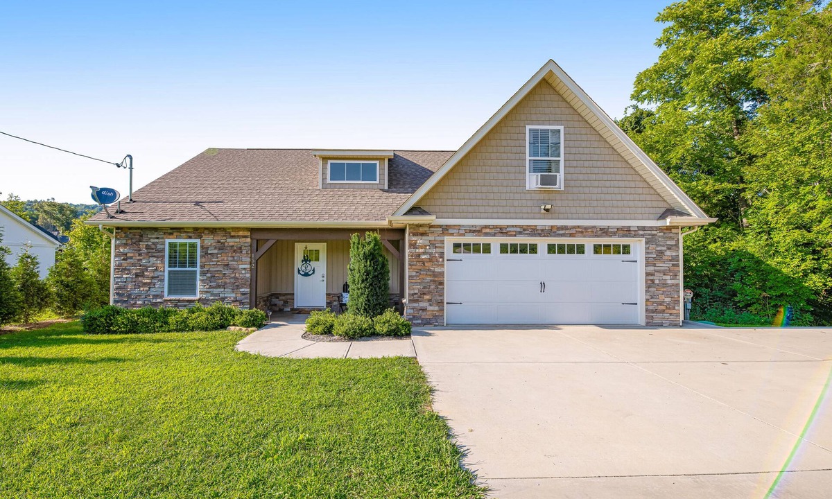 Maynardville House | Spacious, lakefront home with private dock, hot tub, chic decor, & amazing views