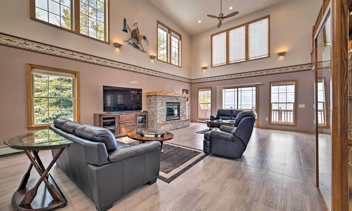 Rogers City House | Spacious Lakefront Home w/ Sunroom & Bar!