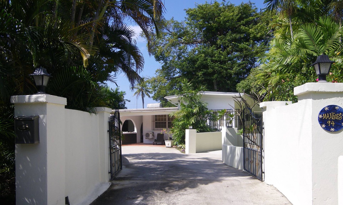 Sunset Crest Villa | Spacious private villa in lush tropical gardens, 2 mins stroll to sea and pool.