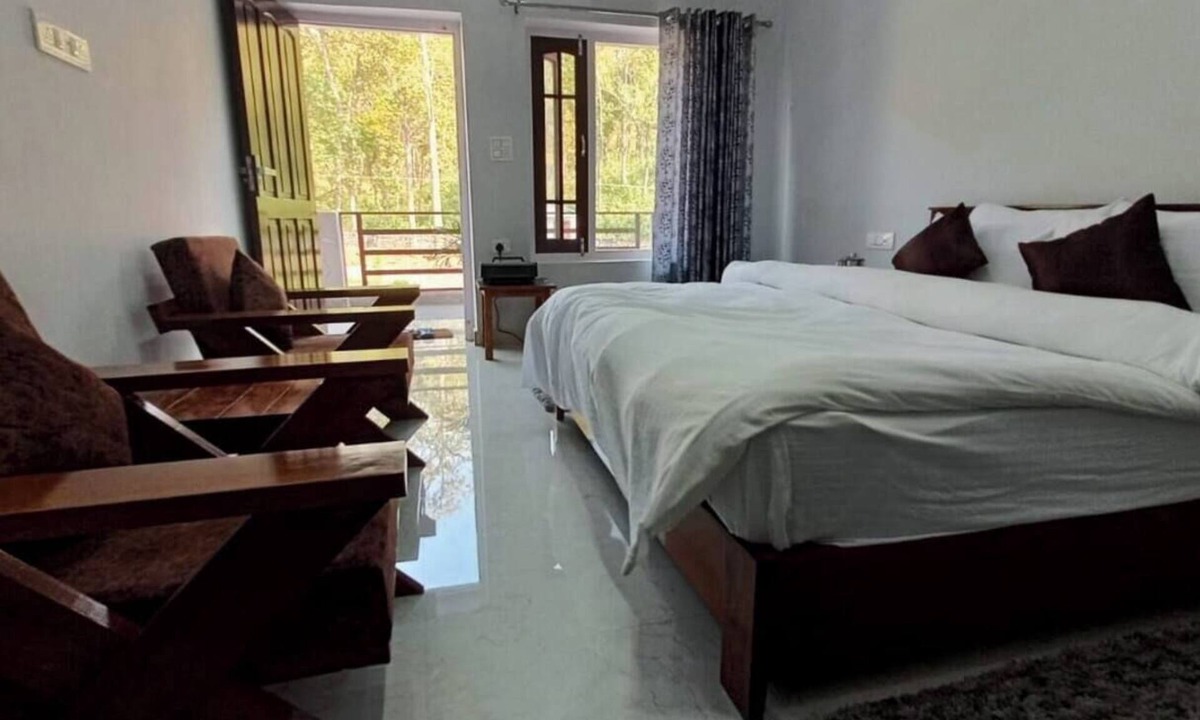 Ramnagar Bed & Breakfast | Spacious Room with Balcony in a Naturalist's Home