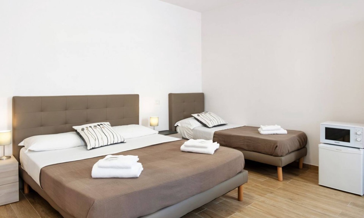 Peraga House | Spacious room with private bathroom is part of the San Vincenzo Rooms Guest House and is perfect for 2 guests. The accommodation is located in the renovated building in Vigonza, which is 10 minutes by car from the center of Padua and on the direct route