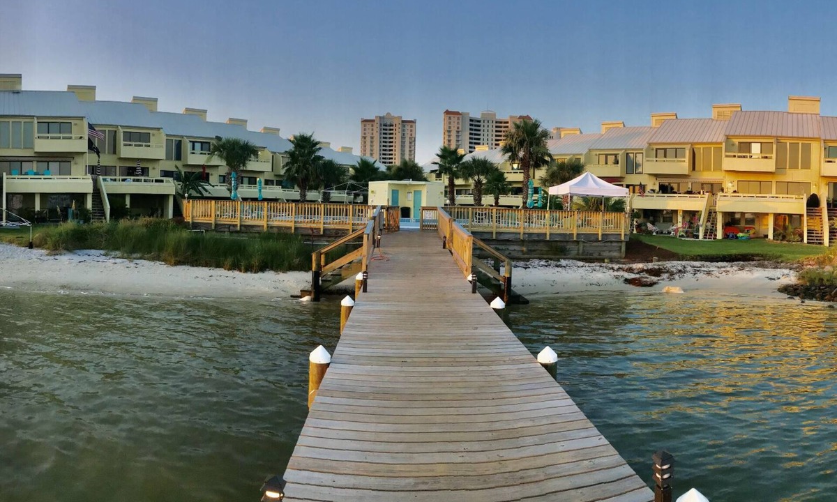 Navarre Beach House | Spacious soundside 3 story townhome, pool, tennis, golf cart, dock and boat lift