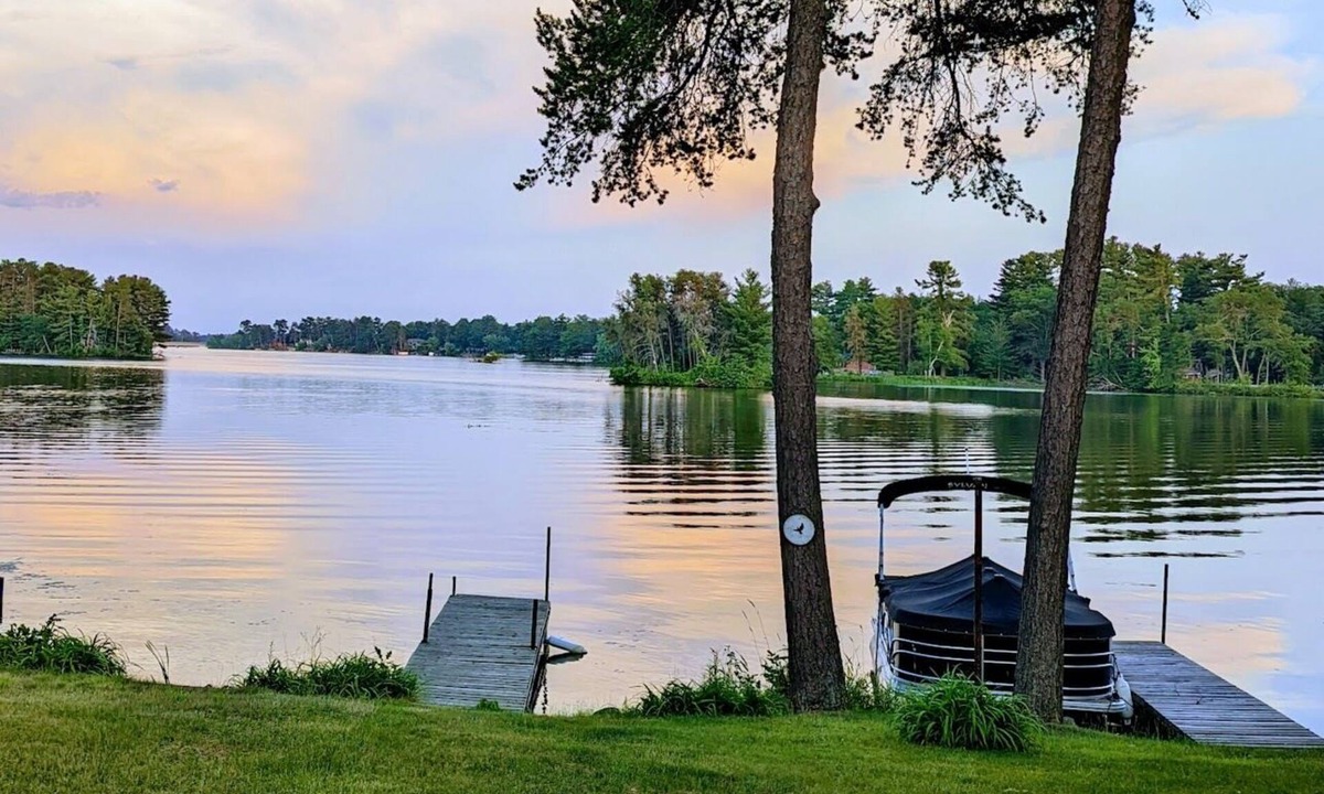 Chetek Condo | Spacious Waterfront with large deck, 2 Docks and Bar/game room