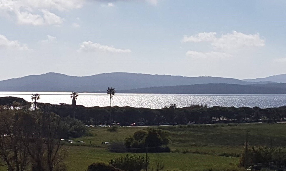 Alghero Apartment | Spectacular Seaview: Apartment Sunshine Only a Few Meters From the Beach of Maria Pia