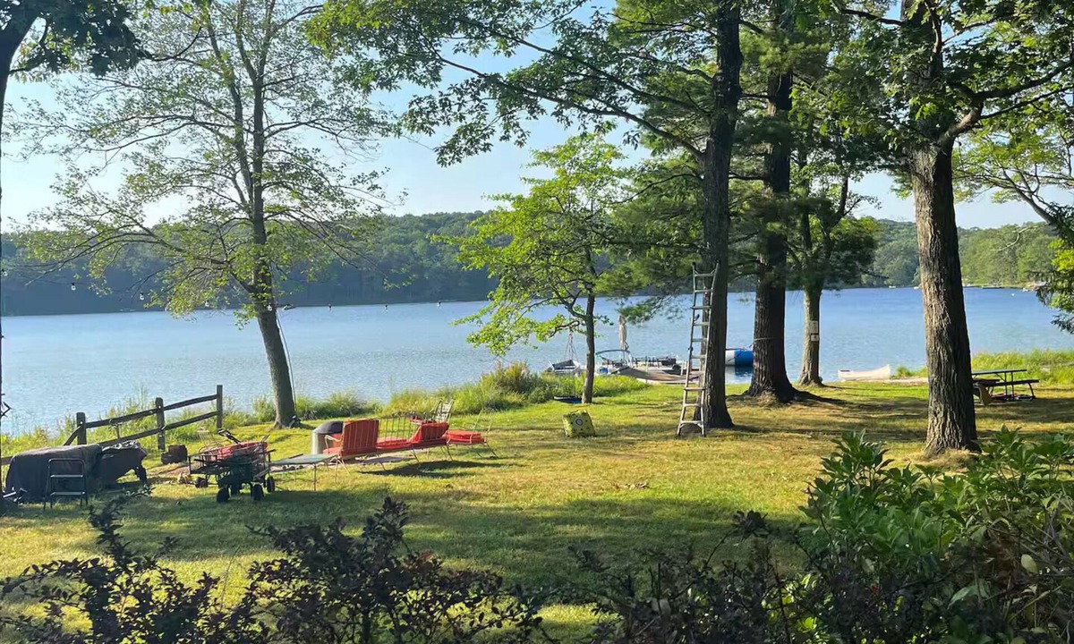 Milford House | Spring fed Lake front home floating dock and boats