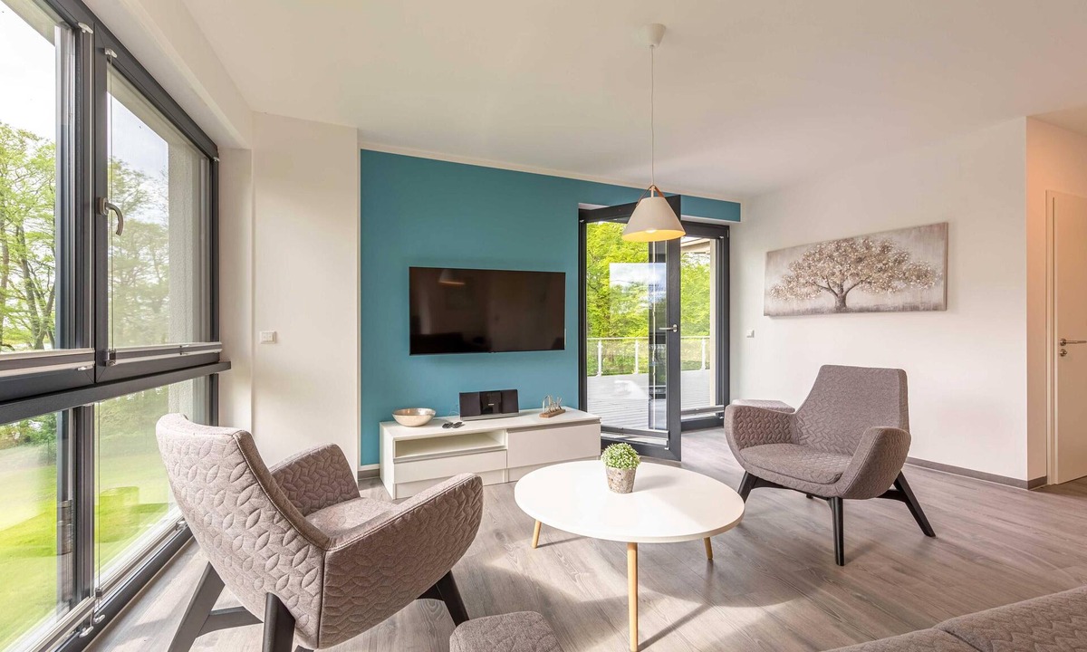 Krakow am See Apartment | Star vacation apartment "Waldkauz" with roof terrace and view of Lake Krakow