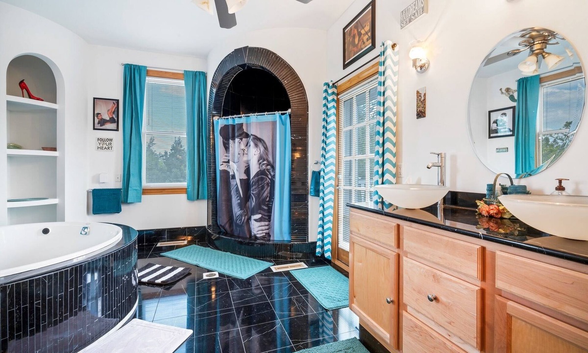Fort Atkinson Villa | Starlight Tower Hot Tub King Suite with 8-Jet Massage Shower by RedAwning