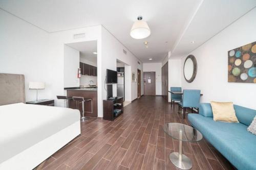 Dubai Sports City Apartment | StoneTree - Spacious Studio - The Matrix