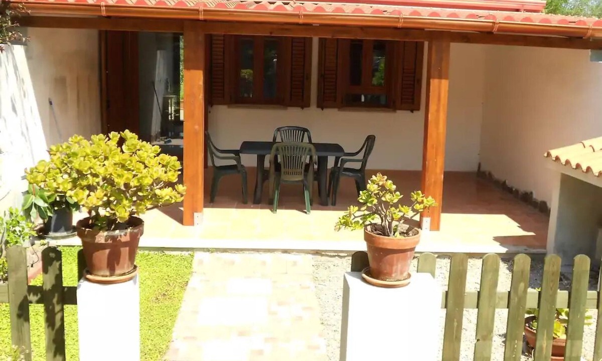 Calasetta Cottage | Studio apartment with patio in front and back terrace with veranda