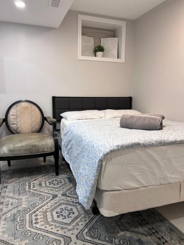 Milton Apartment | Studio Basement Suite with Double Bed and kitchen, Entrance from Garage