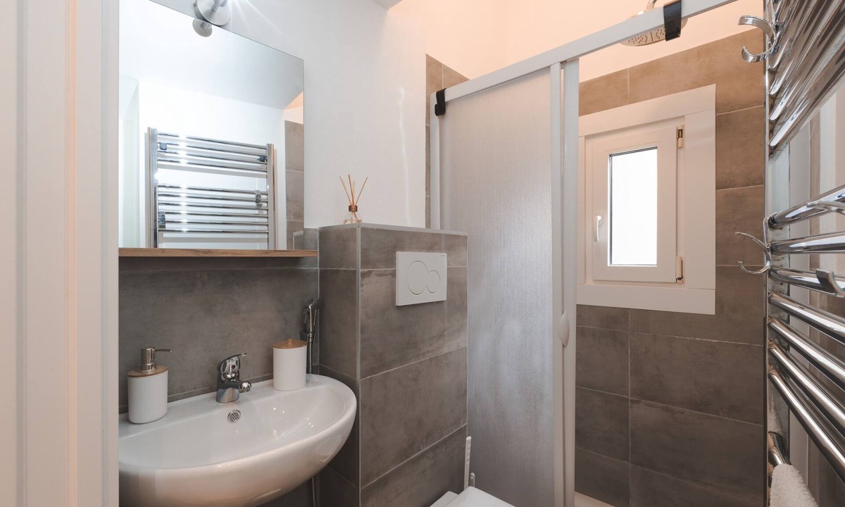 Barriera Vecchia-San Giacomo Apartment | Studio City - Trieste A fully equipped aprtment, at the size of a studio.