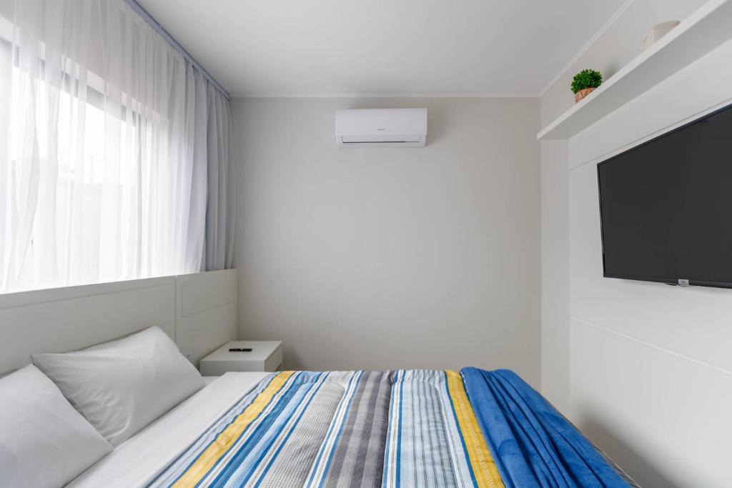 Civic Center Apartment | Studio com 2 quartos e 2 Camas casal - SBO006