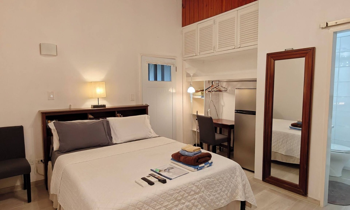 St. John's Apartment | Studio- Spacious garden area/on-site car rental