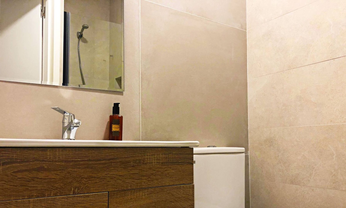 Paseo de Almeria Apartment | Studio with kitchen and private bathroom.