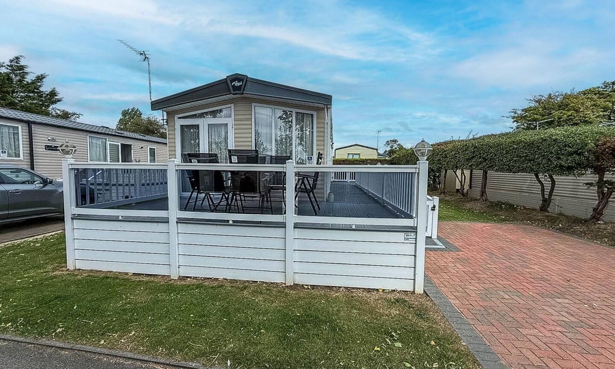 Layer Marney House | Stunning caravan at West Mersea Park with decking ref 75192WM