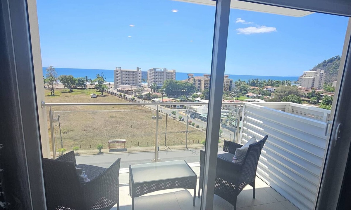 Barrio Santa Lucia Apartment | Stunning new beachfront condo 9th floor ocean view