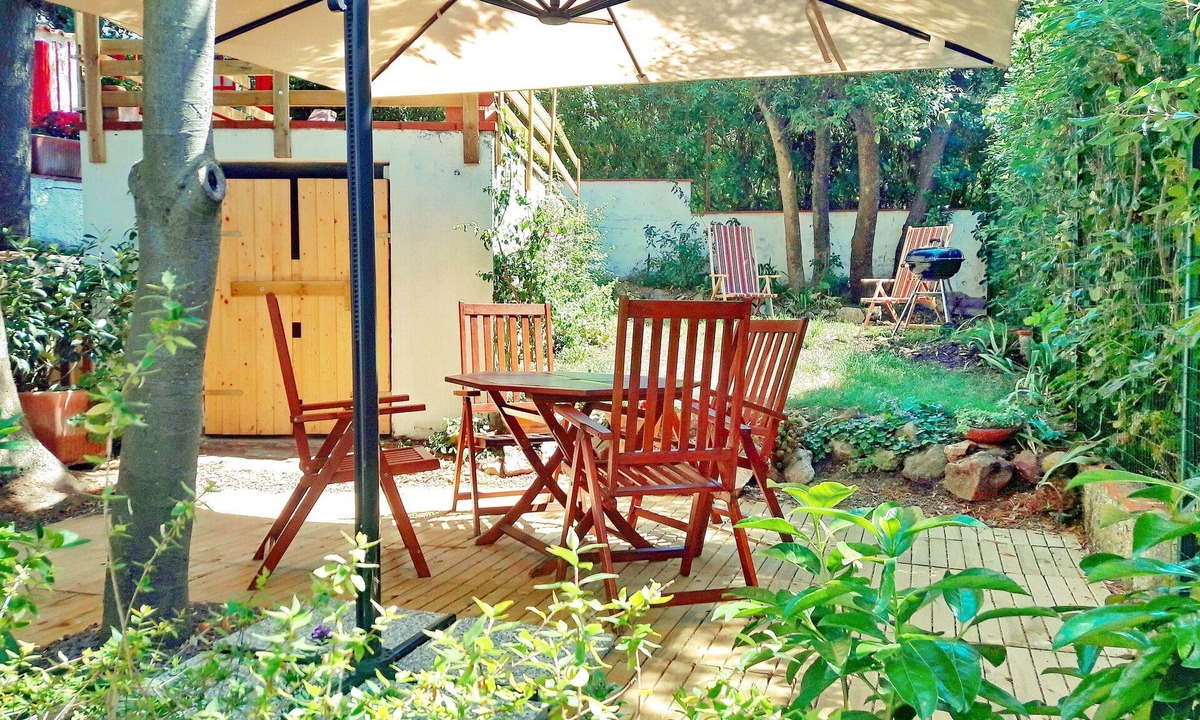 Quercianella Apartment | Stunning panoramic view of the sea, private garden, air conditioning.