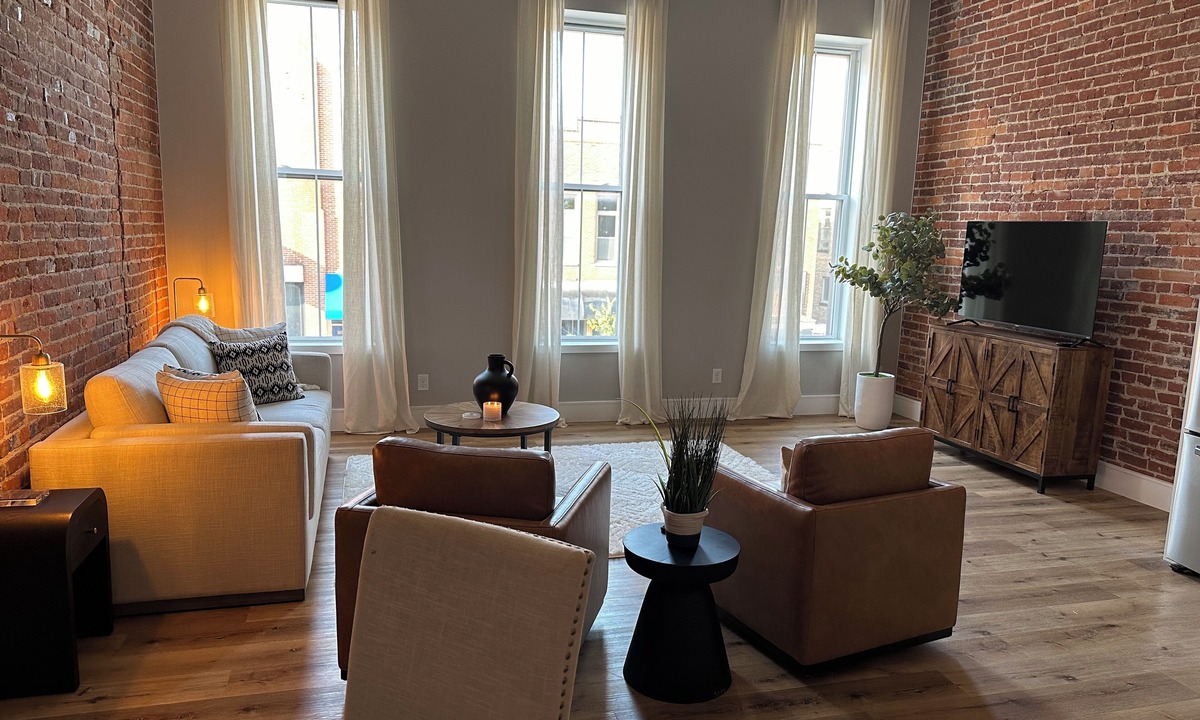 Warsaw Apartment | Stylish & Modern 2-Bdrm Apt in Downtown Warsaw featuring an urban rooftop deck.